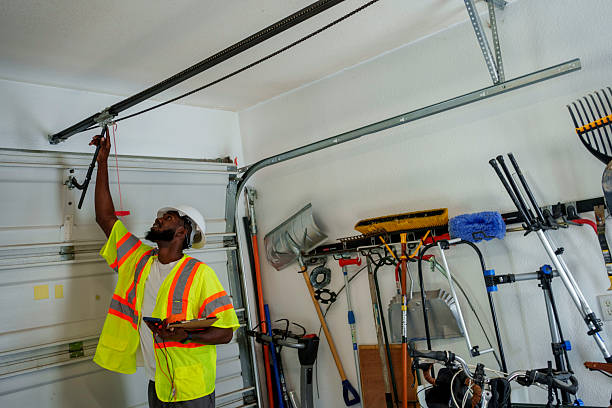 Professional Garage Door Panel Replacement technician working in Gas City, IN